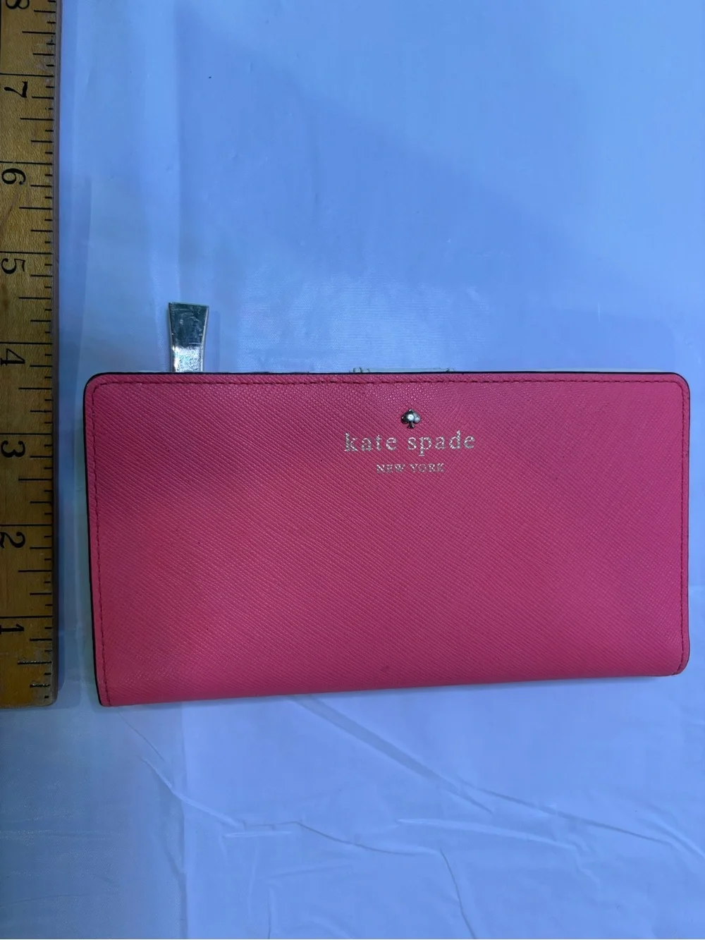kate spade pink saffiano continental zip-around wallet